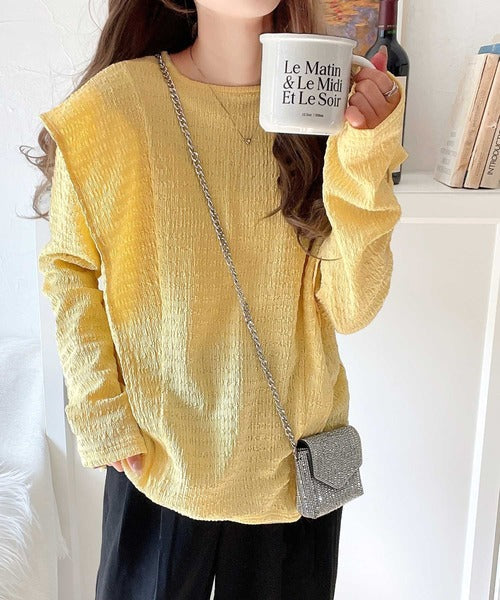 女性らしさとスタイリッシュさを演出する、ジャガード素材ラッフルフリルショルダープルオーバー ce1010347