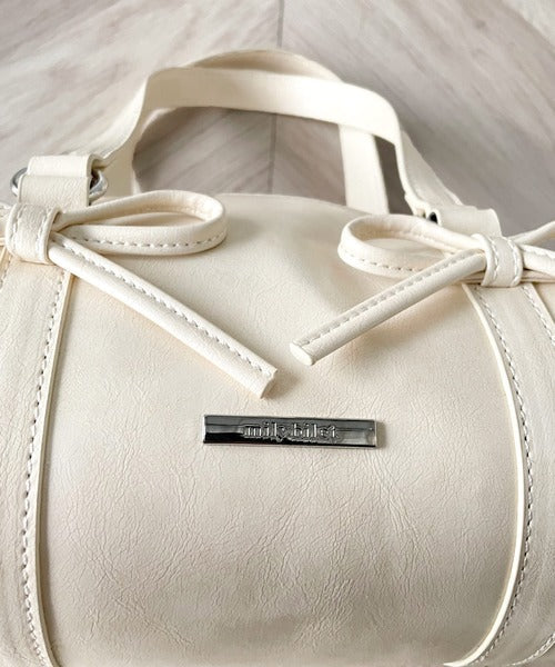【mily bilet】目を惹く可愛さ♪リボンデザイン筒型フェイクレザー２WAYショルダーバッグ mi1159044