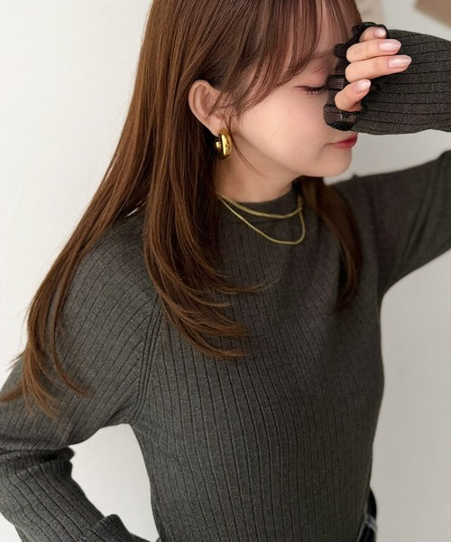 甘さは袖口に、大人可愛いさはさりげなく。配色ラグラン袖シアーフリル使いリブニットトップス ce1380019