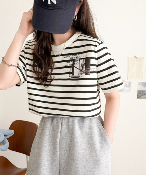 ラフでも品格、シンプルでも存在感。オーガニックコットン混 綿100％ グラフィック飛び刺繍フォトTシャツ（半袖） ce1260537