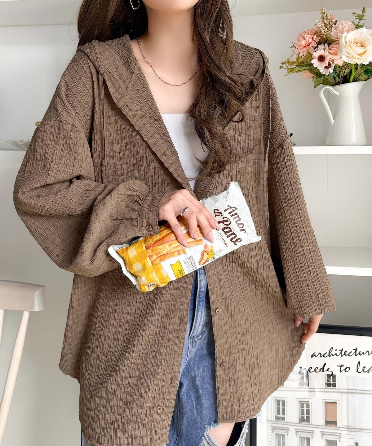ぽわん袖とラウンド裾でこなれ感をプラス。ぽこぽこ素材が可愛い。ふくれシャーリング風フードブラウス（長袖） ce1010580